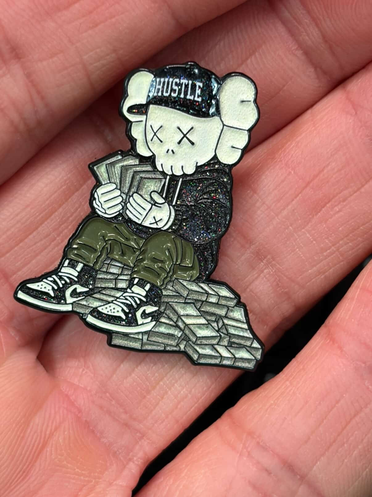 Kaws Break Bread Glow in the Dark Hat Pin
